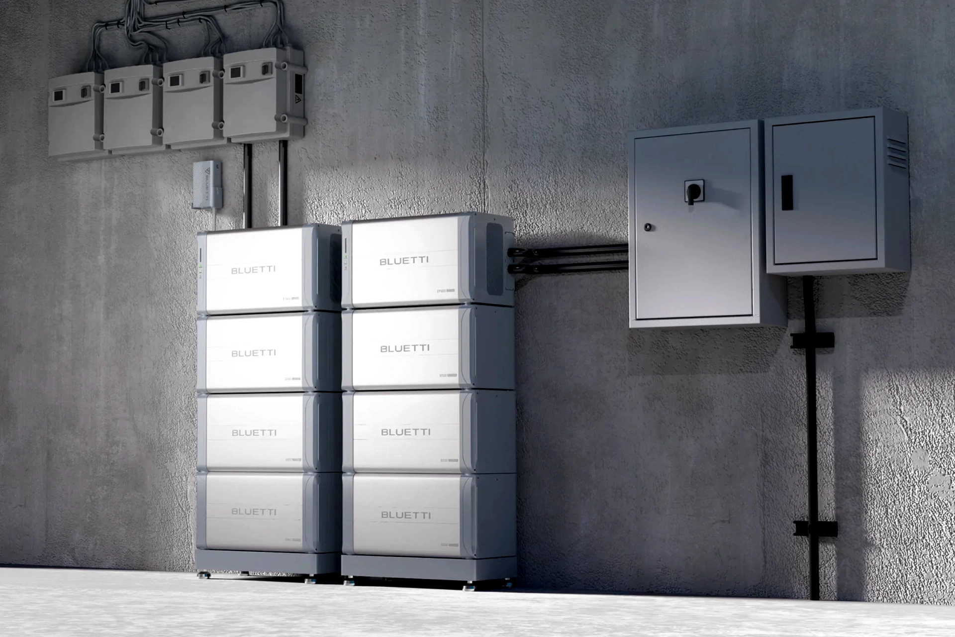 Zewnętrzna instalacja kilku zestawów magazynu energii BLUETTI EP600/B500 podłączonych do rozdzielni elektrycznej budynku